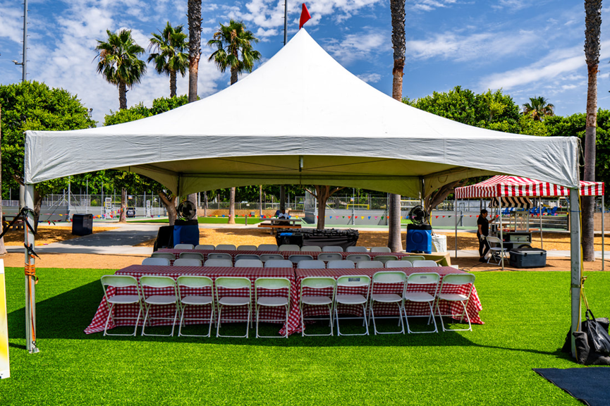 A vibrant food vendor tent attracting customers.