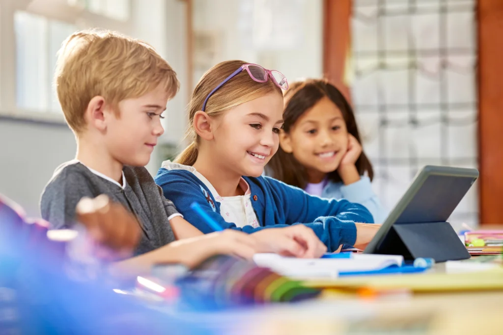 diverse-group-of-students-using-technology-and-collaborating-in-modern-21st-century-classroom