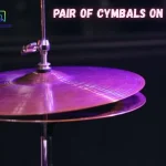 pair of cymbals on a drum set