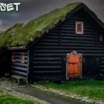 Traditional Danish pindhuset wooden house with thatched roof in a quiet village