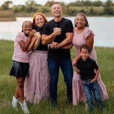 Josh Howerton with wife Jana and their three children standing outdoors