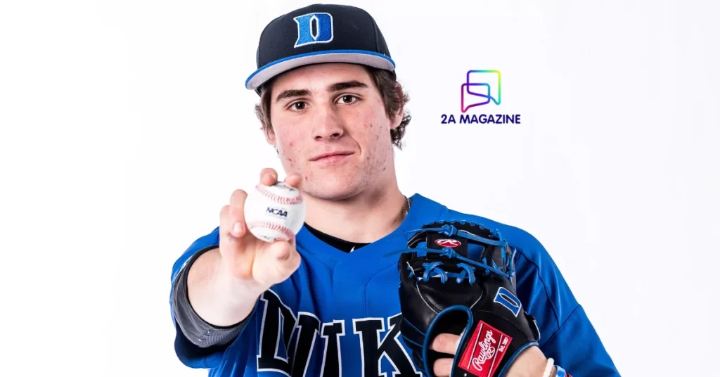Billy Seidl in his blue Duke University baseball uniform holding a baseball and wearing a pitching glove.