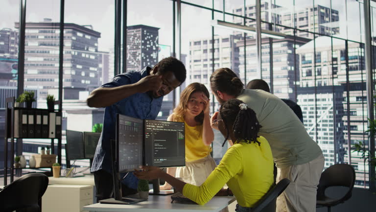 Security team reviewing system data and threat alerts together, droven io cybersecurity updates response