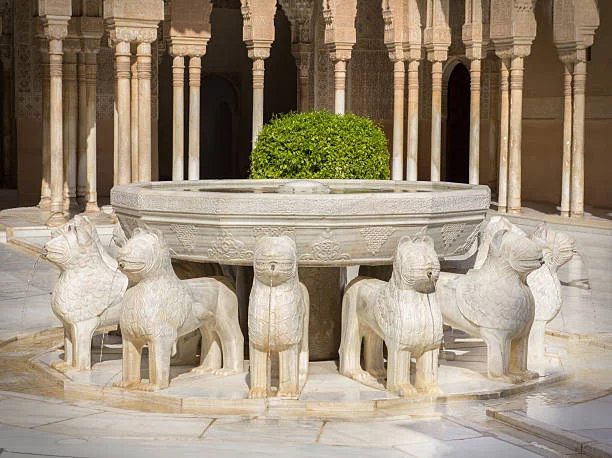 Court of the Lions courtyard inside the Alhambra with marble columns and fountain