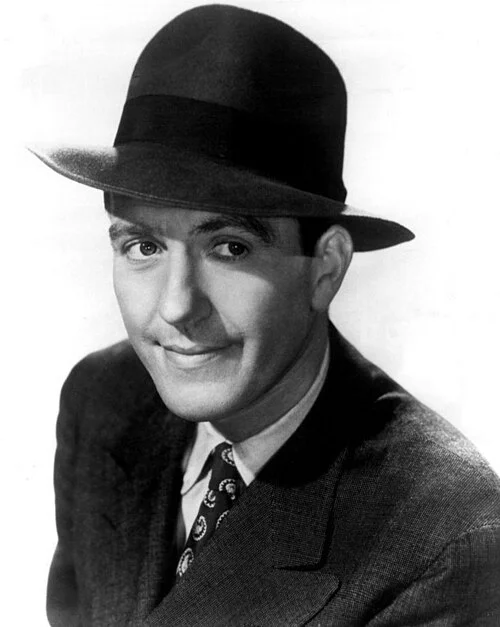 Black and white 1956 studio portrait of actor Hugh Beaumont, best known for playing Ward Cleaver on Leave It to Beaver