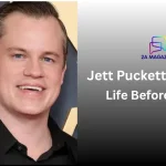 Jett Puckett smiling in a black suit — 2A Magazine's "Jett Puckett Biography: Life Before Pookie"