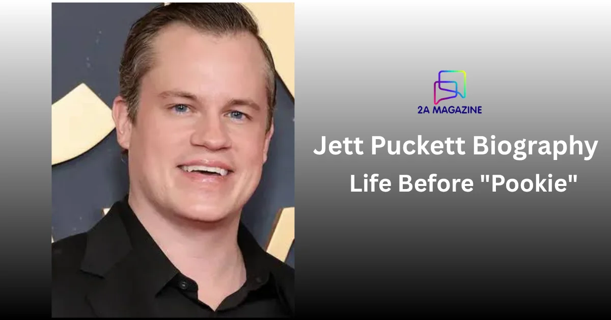 Jett Puckett smiling in a black suit — 2A Magazine's "Jett Puckett Biography: Life Before Pookie"