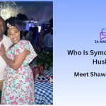 Symone Sanders with her husband Shawn Townsend at an outdoor evening event in Washington, D.C., with fireworks in the background