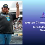 Westen Champlin flashing a peace sign in his Redneck Science t-shirt and Horsepower Rodeo cap at a motorsports event