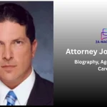 Attorney Joe Tacopina in a professional studio headshot wearing a dark suit and blue tie